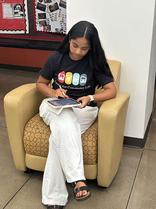 student sitting in comfortable chair