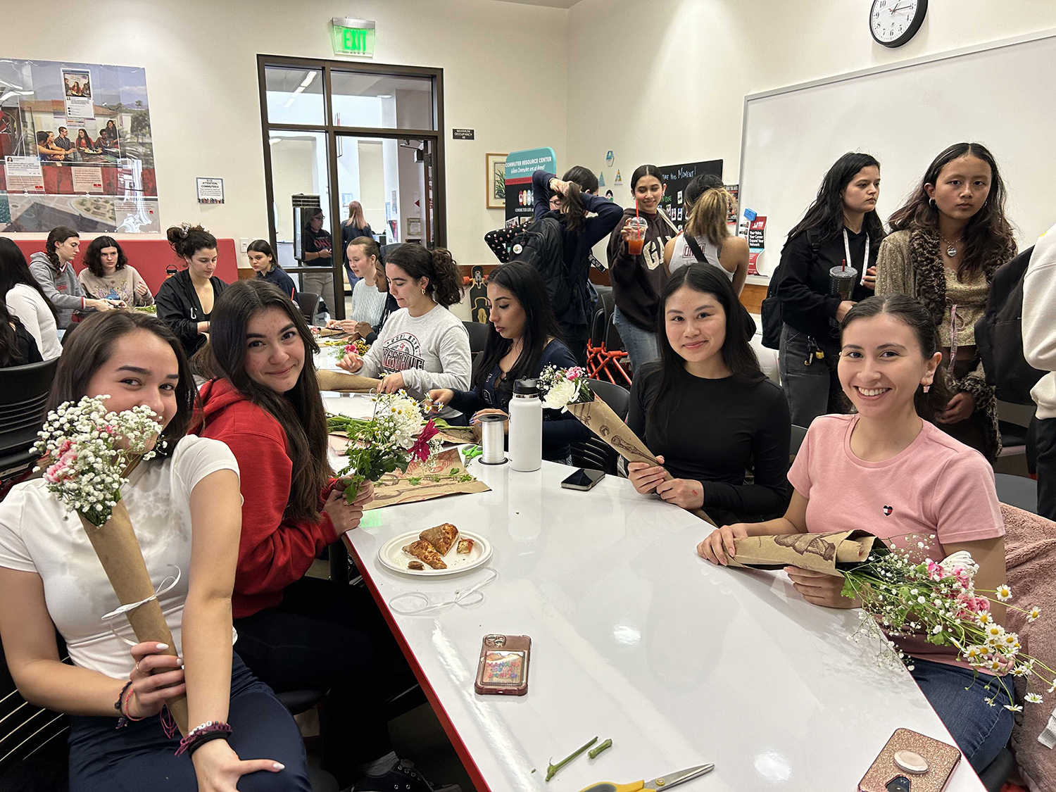 event with students and flowers